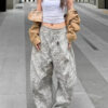 Distressed Washed Leopard Print Jeans